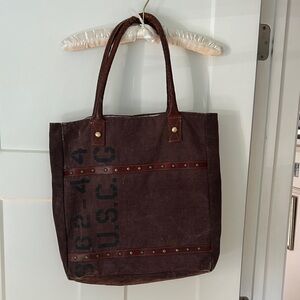 Mona B Burgundy Tote with Cream and Green print lining.